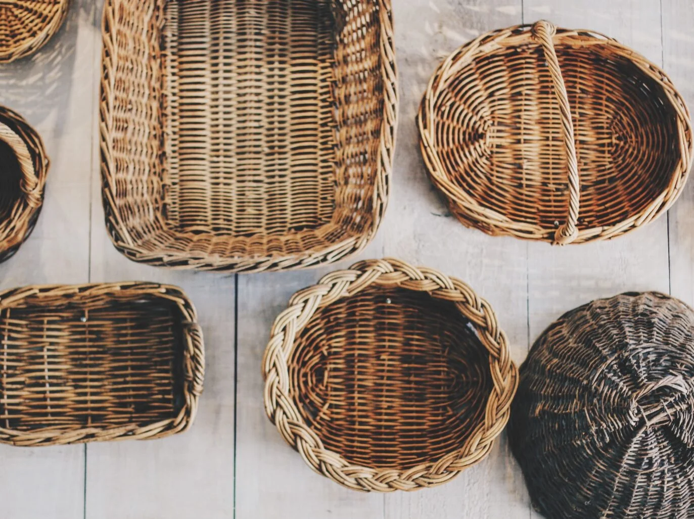 Brown wicker basket lot as accessories for a classic coastal home style
