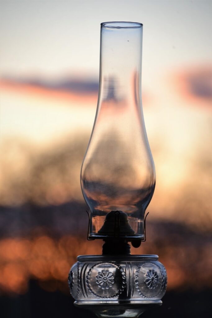 clear glass light bulb in close up photography