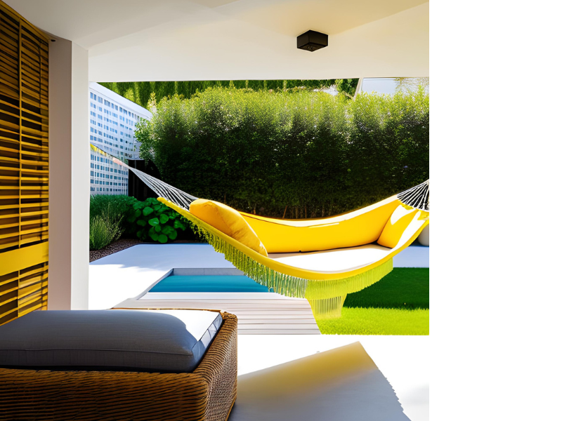 Coastal Yellow Patio lounging area with a yellow hammock and a rattan ottoman 