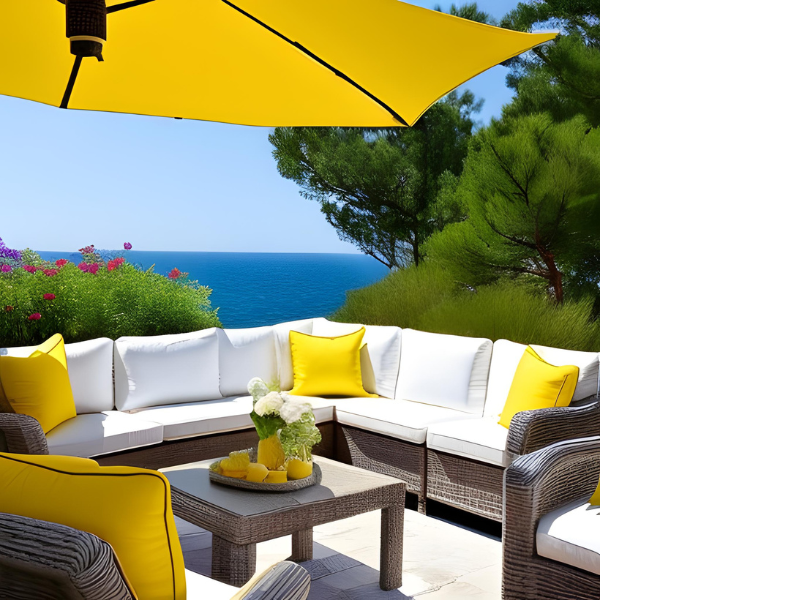 Coastal Yellow Patio idea, with coastal outdoor furniture, L-shape rattan sofas with white cushions and yellow outdoor throw pillows, a yellow umbrella, and a yellow centerpiece in a rattan coffee table