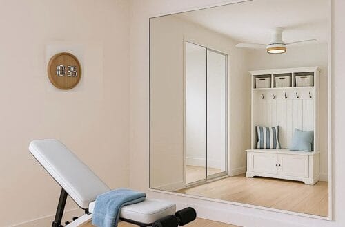 Coastal Home Gym with wood floor mat, white hall tree, white workout bench