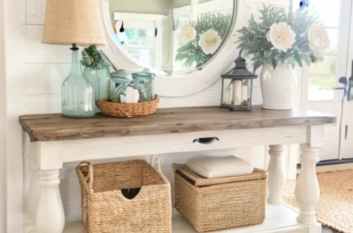 a coastal style entryway table and decor