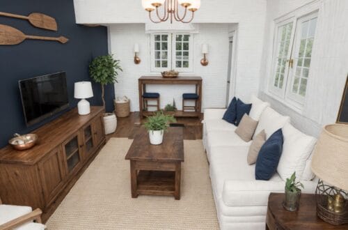 Nautical Living Room, white sofa, wood furniture, brick wall, navy blue
